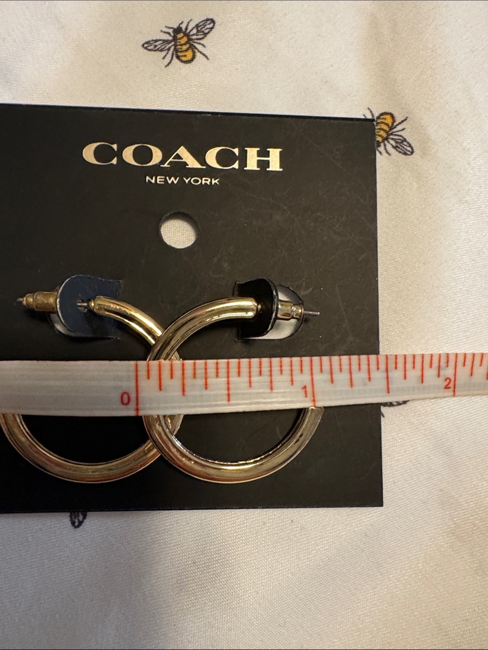 Coach Gold-Tone C-Shaped Hoop Earrings - Picture 3 of 4